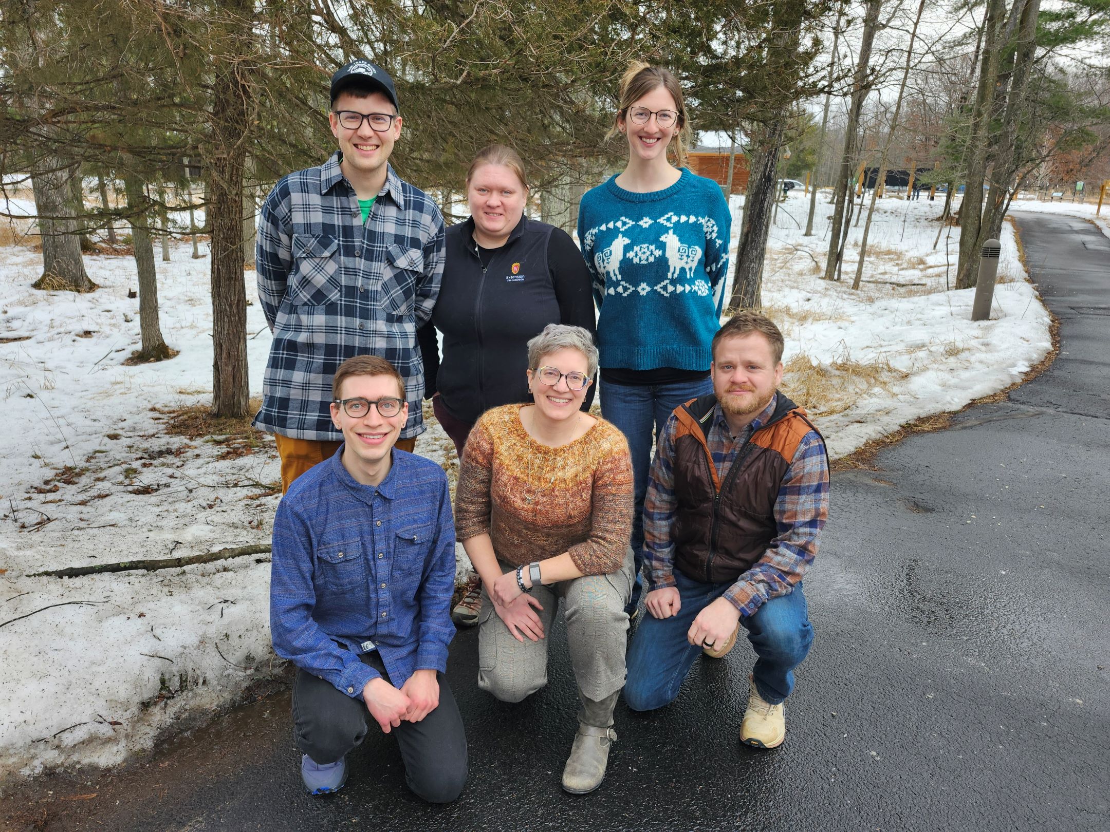 six people outside in winter